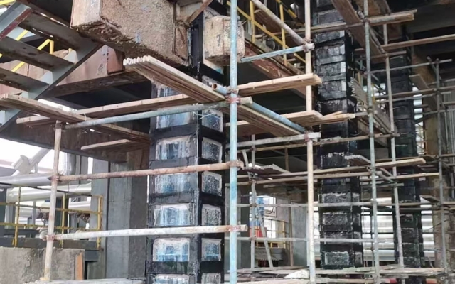 湖北宜化化工有限公司厂房立柱包钢加固 - 信阳通合建筑加固公司