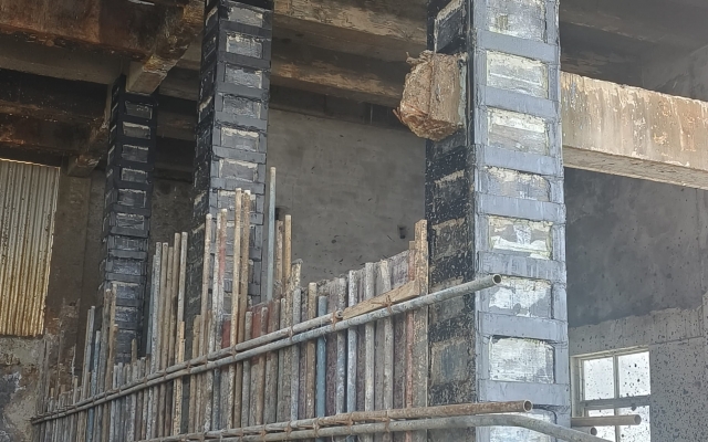 湖北宜化化工有限公司厂房立柱包钢加固 - 信阳通合建筑加固公司